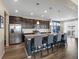 Modern kitchen with stainless steel appliances and an island at 3260 Jonquil St, Castle Rock, CO 80109