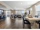 Open living room and dining area with hardwood floors at 3260 Jonquil St, Castle Rock, CO 80109