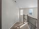 Upstairs hallway with carpet and railing at 3260 Jonquil St, Castle Rock, CO 80109