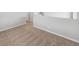 Upstairs hallway with neutral carpet and walls leading to bedrooms and other living areas at 2134 Alyssa St, Fort Lupton, CO 80621