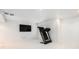 Finished basement featuring a wall-mounted TV and treadmill for exercising at home at 5607 S Gray St, Littleton, CO 80123
