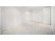 Finished basement room with neutral carpet, white walls, and closet at 5607 S Gray St, Littleton, CO 80123
