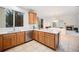 Spacious kitchen featuring stainless steel appliances, and a breakfast bar at 5607 S Gray St, Littleton, CO 80123