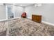 Inviting basement features durable flooring, ample space, and stylish accents, ideal for versatile use and entertainment at 5747 W Elmhurst Ave, Littleton, CO 80128