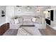 Comfortable living room with soft sofa, plush rug, and stylish decor at 5747 W Elmhurst Ave, Littleton, CO 80128