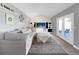 Spacious living room boasts neutral walls, vaulted ceiling, comfortable seating, and access to the patio at 5747 W Elmhurst Ave, Littleton, CO 80128