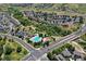 Aerial view of the neighborhood pool and surrounding green spaces at 11973 Song Bird Hills St, Parker, CO 80138
