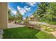 Cozy backyard featuring a patio, seating, a grill, and lush landscaping at 11973 Song Bird Hills St, Parker, CO 80138