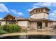 Elegant clubhouse with stone accents, well-manicured landscaping, and covered entryway at 11973 Song Bird Hills St, Parker, CO 80138