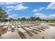Community pool featuring ample seating, umbrellas, and a clear blue pool at 11973 Song Bird Hills St, Parker, CO 80138