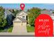 Charming two-story home with a three-car garage, mature trees, and professional landscaping at 11973 Song Bird Hills St, Parker, CO 80138