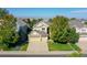 Beautiful aerial view of a home with a three car garage and mature landscaping at 11973 Song Bird Hills St, Parker, CO 80138