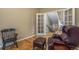Comfortable office space with hardwood floors and a view to the stairway landing at 11973 Song Bird Hills St, Parker, CO 80138