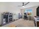 Bright office space with large windows, a ceiling fan, and ample storage for creative projects at 11973 Song Bird Hills St, Parker, CO 80138