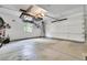 Clean and spacious garage with storage racks and great lighting at 3726 Spring Valley Trl, Evergreen, CO 80439