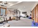 Home gym with workout equipment, including a rowing machine and free weights at 3726 Spring Valley Trl, Evergreen, CO 80439