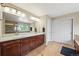 This bathroom has a double vanity, granite countertops, and a separate tiled shower at 15756 E Aberdeen Ave, Centennial, CO 80016