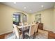Elegant dining room with a large table and stylish decor, perfect for entertaining guests at 15756 E Aberdeen Ave, Centennial, CO 80016