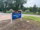 Majestic View Park signage amid lush green trees and greenery at 7079 Estes Dr, Arvada, CO 80004