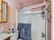 This bathroom features a bathtub, shower, and mirrored medicine cabinet at 1265 Colorado Blvd # 7, Denver, CO 80206