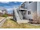 Backyard featuring a deck, patio and stairs leading to the yard at 8459 Sweet Clover Way, Parker, CO 80134
