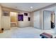 Spacious basement with custom alcoves, neutral carpet, and bright lighting at 8459 Sweet Clover Way, Parker, CO 80134