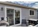 Outdoor deck area with a barbecue, grill, and seating perfect for entertaining guests at 8459 Sweet Clover Way, Parker, CO 80134