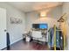 View of a well-lit home office with dual monitors, grey walls, and black trim at 8459 Sweet Clover Way, Parker, CO 80134