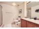 Clean bathroom with shower, toilet and vanity at 5800 Tower Rd # 103, Denver, CO 80249