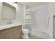 Bathroom featuring a shower/tub combo with a modern white tile surround at 3044 Wilson Ct # 2, Denver, CO 80205
