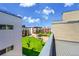 A lush courtyard provides a serene view, complete with a pond and modern architectural design at 3044 Wilson Ct # 2, Denver, CO 80205