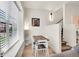 Cozy dining area with views of the window and stairs at 3044 Wilson Ct # 2, Denver, CO 80205