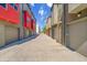 Garage access to modern homes is located on an open, well-lit street with colorful accents at 3044 Wilson Ct # 2, Denver, CO 80205