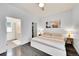 Bright main bedroom featuring an ensuite bathroom and walk-in closet at 3044 Wilson Ct # 2, Denver, CO 80205