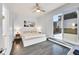 Sun-filled main bedroom with sliding glass doors to an outdoor patio at 3044 Wilson Ct # 2, Denver, CO 80205
