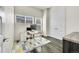 Office with modern desk, window views, and wood floors at 3044 Wilson Ct # 2, Denver, CO 80205