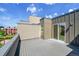 The rooftop deck features sliding glass doors and ample room for enjoying outdoor living at 3044 Wilson Ct # 2, Denver, CO 80205