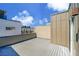 An expansive rooftop deck offers an outdoor living space perfect for entertaining and enjoying city views at 3044 Wilson Ct # 2, Denver, CO 80205