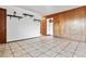 Open living area featuring tile floors, neutral walls, and bright lighting at 4940 W 9Th Ave, Denver, CO 80204