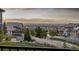 Enjoy panoramic mountain and city views from this beautifully landscaped property at 10698 Mountaingate Ct, Littleton, CO 80126