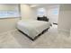 Bedroom featuring neutral colored walls, gray carpet, and windows allowing natural light at 7949 W Portland Ave, Littleton, CO 80128