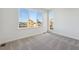 Bright bedroom featuring large windows offering expansive neighborhood views at 1243 Rhett Dr, Erie, CO 80026