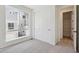 Bright bedroom with natural light and a closet and entry to another room at 1243 Rhett Dr, Erie, CO 80026