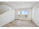 Bright living space features a door to a balcony with great neighborhood views at 1243 Rhett Dr, Erie, CO 80026