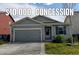 Charming single-story home with a well-maintained lawn and attached garage at 370 Mesa Ave, Brighton, CO 80603
