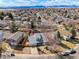 Aerial view of the home, showing proximity to nearby houses and mountain views at 10053 Lewis St, Broomfield, CO 80021