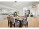 Inviting dining room featuring modern lighting and seamless transition to the kitchen and living areas at 10053 Lewis St, Broomfield, CO 80021