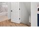 Hallway with access to a marble tiled bathroom at 3640 Forest St, Denver, CO 80207