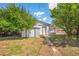 Backyard shed with extra storage space and a well-kept yard, adding practicality to the outdoor area at 3640 Forest St, Denver, CO 80207
