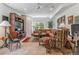 Spacious living room features comfortable seating, natural light, and a decorative entertainment center at 6948 W Jewell Dr, Lakewood, CO 80227